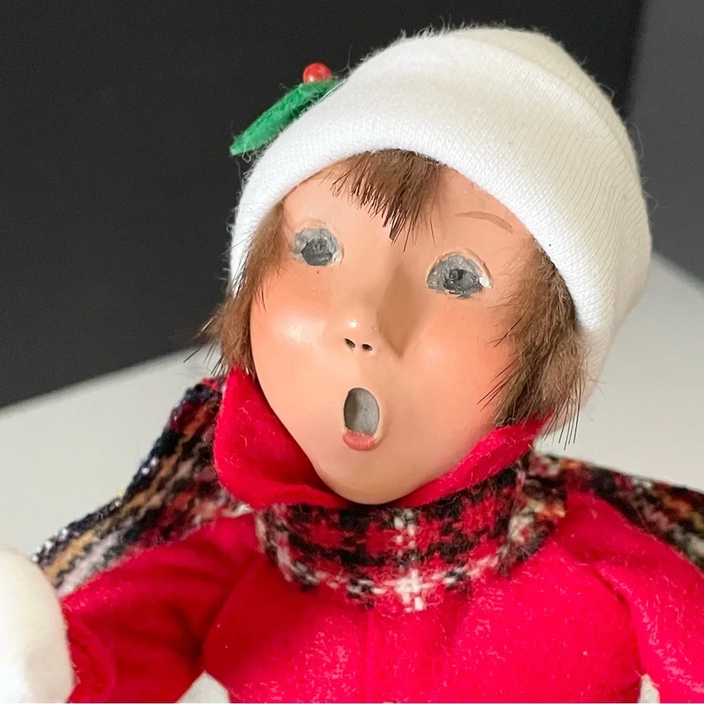 Child Caroler with Sheet Music by Byer's Choice
